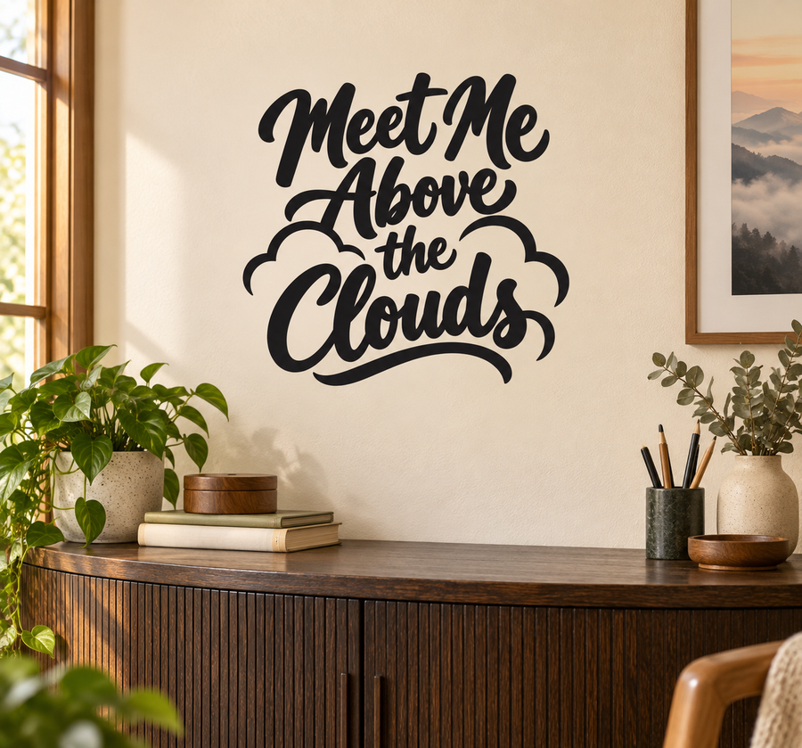 Black script vinyl wall decal reading "Meet Me Above the Clouds"