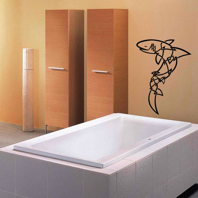 Barbed wire shark wall decal with black outline on light wall