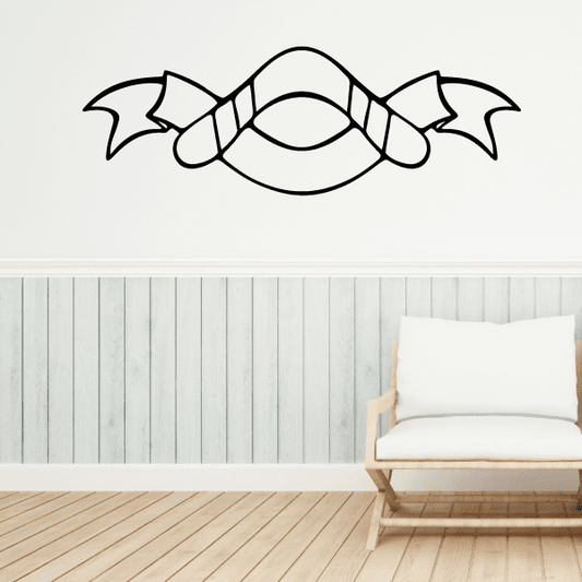 Boomerang decal in black outline, with curved center and bow-like ends