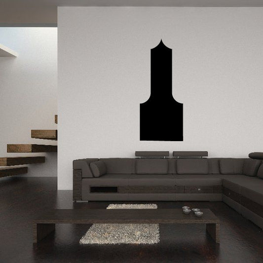 Building decal featuring a tall black architectural silhouette shape