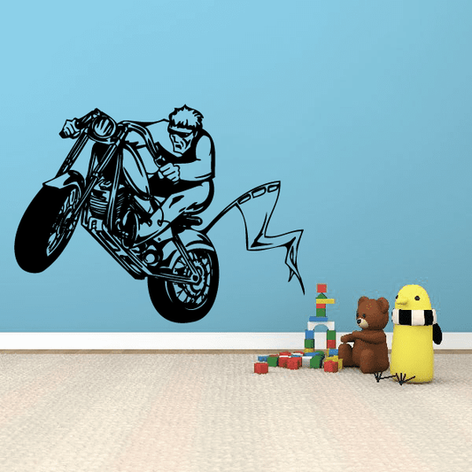 Black vinyl wall decal of biker on chopper motorcycle