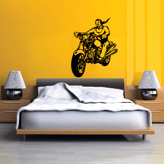 Vinyl wall decal of a yellow chopper motorcycle rider, black outline