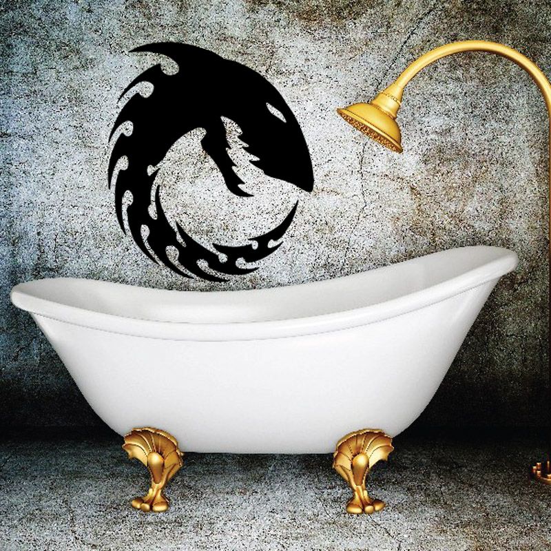 Black shark circle shadow decal on wall above white clawfoot bathtub.