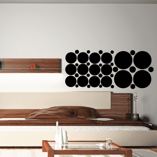 Black circle wall decal set with assorted large and small dot designs