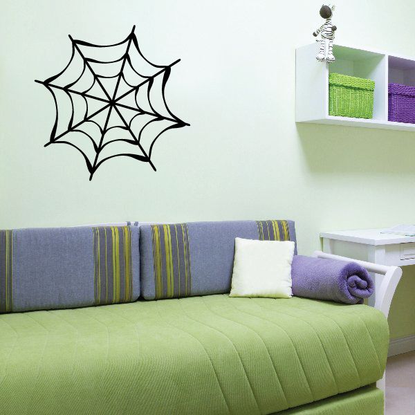 Black spider web wall decal with eight radiating spokes and circular web pattern