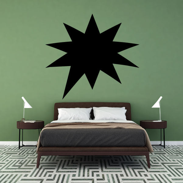 Black spiky comic burst wall decal with a filled starburst shape