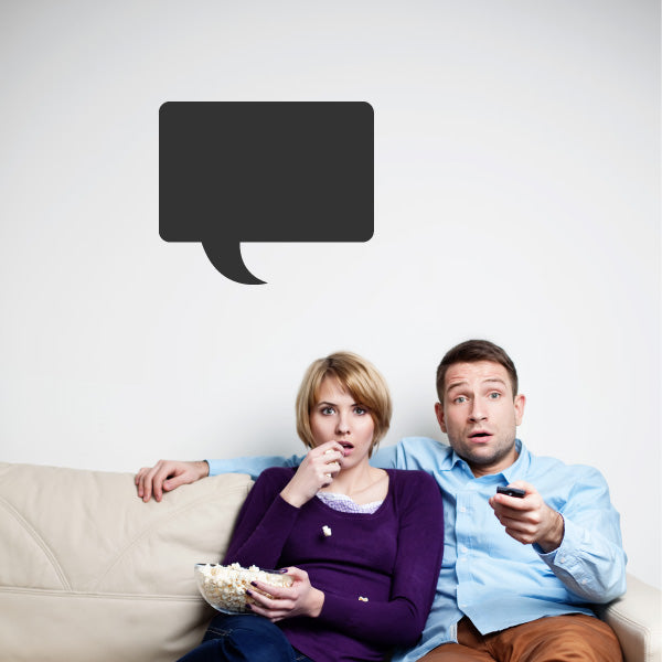 Square speech bubble decal with curled bottom tail, dark gray/black
