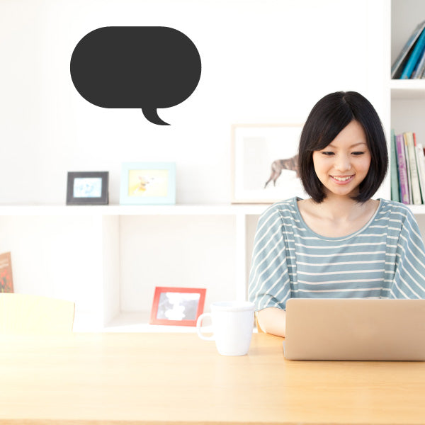 Black rounded oblong speech bubble decal with curled tail