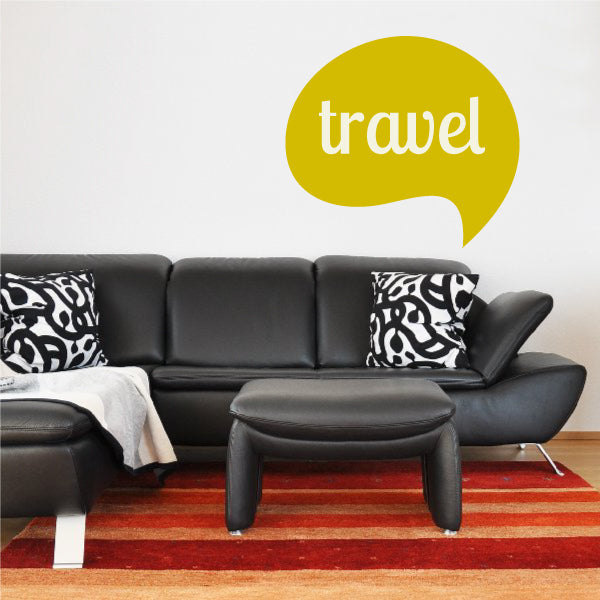 Mustard yellow speech bubble sticker with white 'travel' lettering