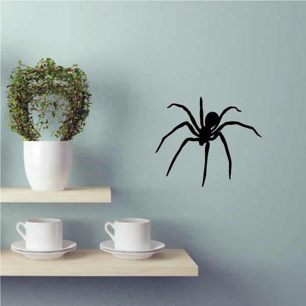 Creeping black spider wall decal with long legs