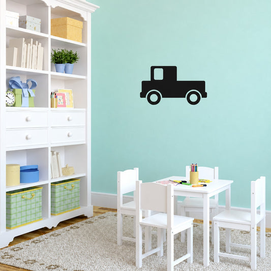 Vinyl wall decal with black truck icon and light green window accents