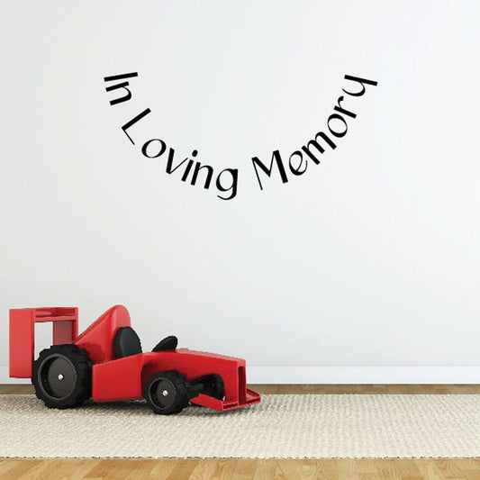 Wall vinyl decal reading "In Loving Memory" in black cursive script