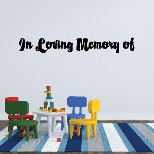 Vinyl wall decal with text 'In Loving Memory of' in black script