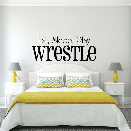 Wall decal reading 'Eat, Sleep, Play Wrestle' with large 'WRESTLE' letters