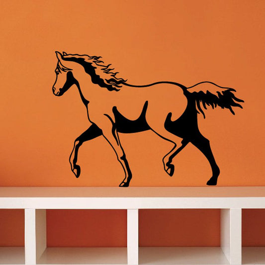 Black walking horse silhouette decal with flowing mane and tail