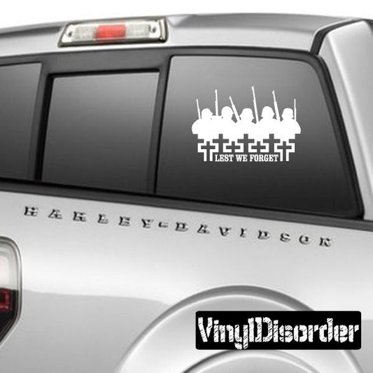 Fallen soldiers decal: skyline, crosses, and 'LEST WE FORGET' on window