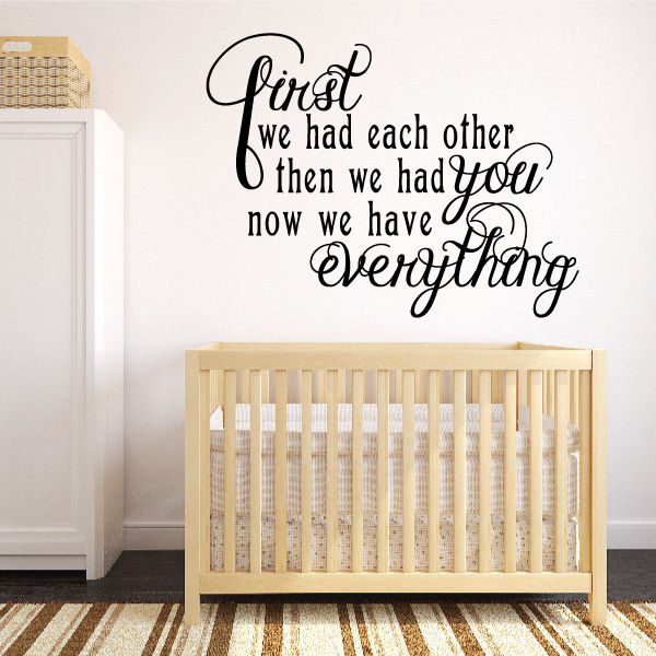 Wall decal with black cursive quote: 'First we had each other... now we have everything'