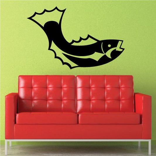 Black fish vinyl wall decal with curved body and pointed tail