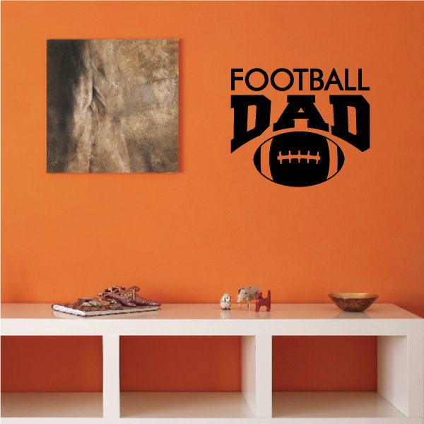 Football dad decal with bold 'FOOTBALL DAD' lettering and football graphic