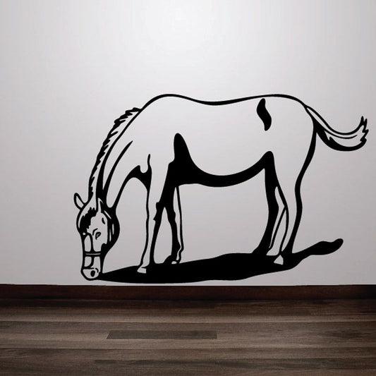 Grazing horse wall decal, black silhouette of a grazing horse with head down.