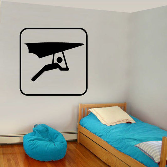 Square hang gliding sign decal with black glider icon and border