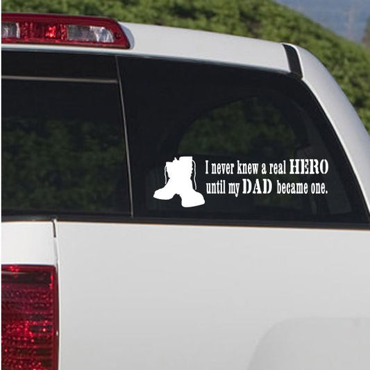 Car window decal with soldier silhouette and quote text: 'real HERO' 'DAD became one'.