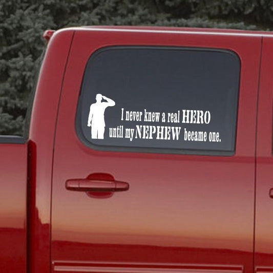 Hero quote decal with white silhouette and text on dark window