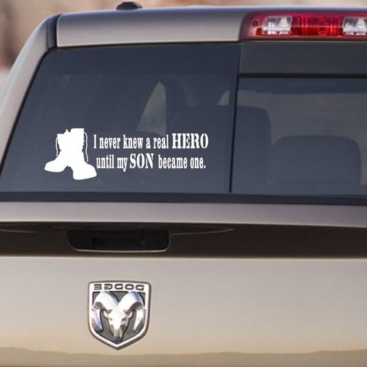 Car window decal with white hero quote and animal silhouette