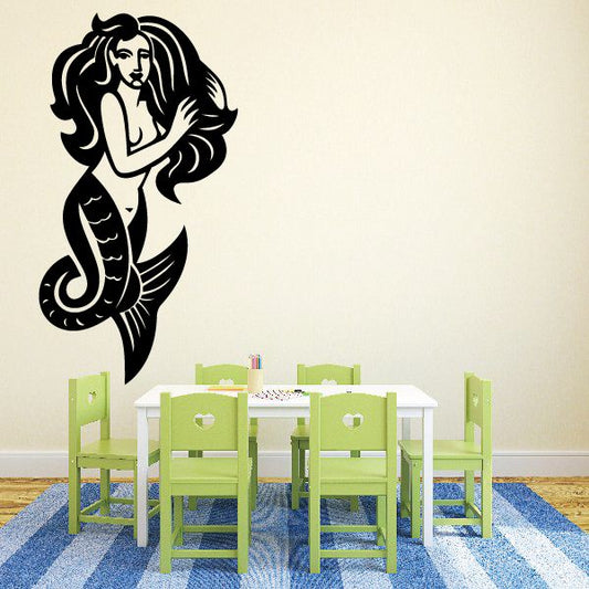 Mermaid decal with black illustrated mermaid sitting, long flowing hair