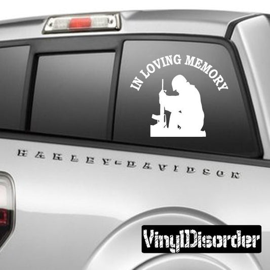 Black car window decal with praying soldier silhouette and “In Loving Memory” text