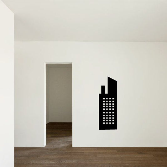 Industrial building wall decal: black skyscraper silhouette with white dot windows