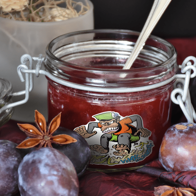 Stickers featuring a jar of jam accompanied by a spoon and plums design