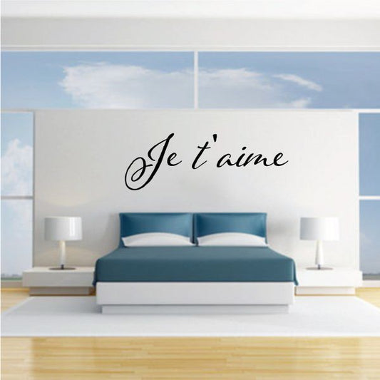 Wall decal with "Je t'aime" script lettering