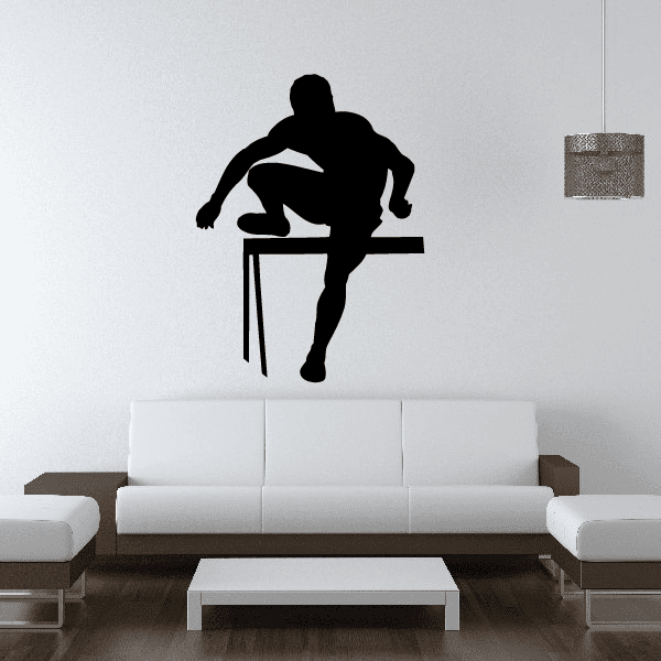 Male hurdler silhouette wall decal, black figure jumping over hurdle