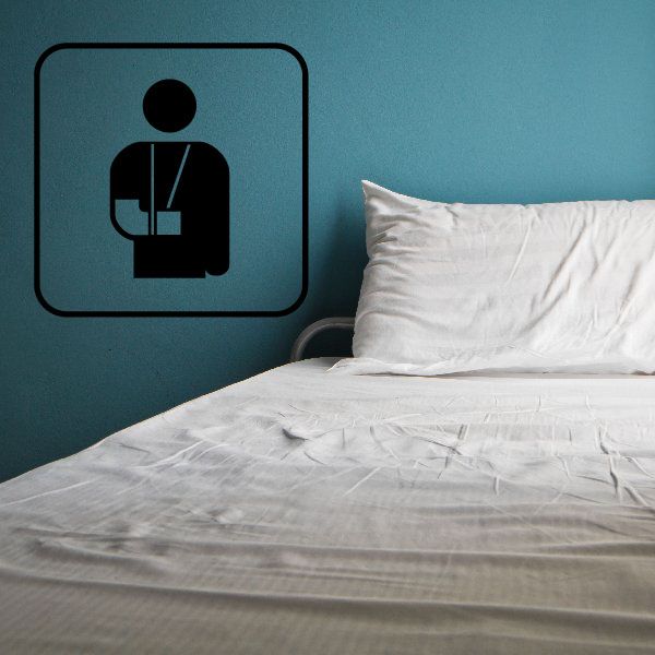 Medcal help sign decal with black seated person icon