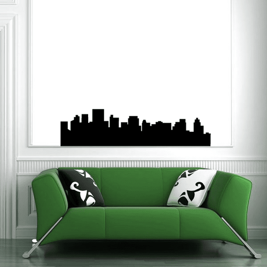 Black city skyline wall decal silhouette across white window
