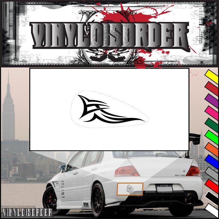 Vinyl tribal motorcycle tank decal with black winged design on white background
