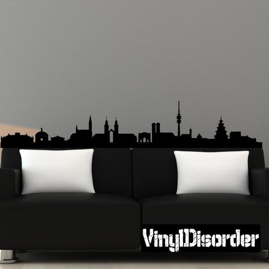 Munich skyline wall decal, black city silhouette with church and tower shapes.