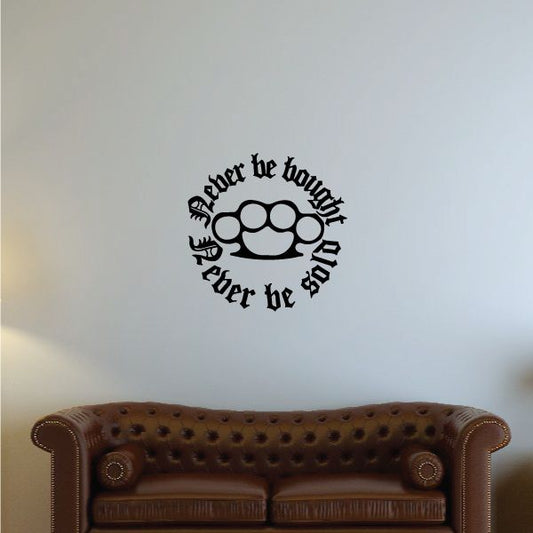 Black brass knuckles decal with circular knuckle graphic and curved text