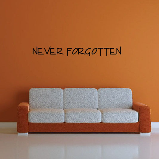Wall decal with text "NEVER FORGOTTEN"