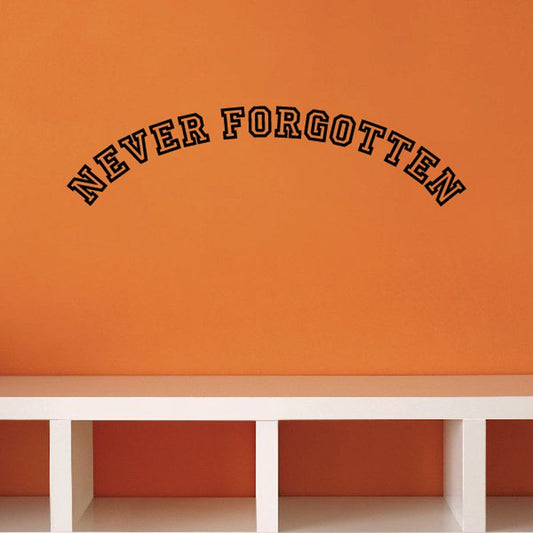 Vinyl wall decal reading "Never Forgotten" in arched black letters