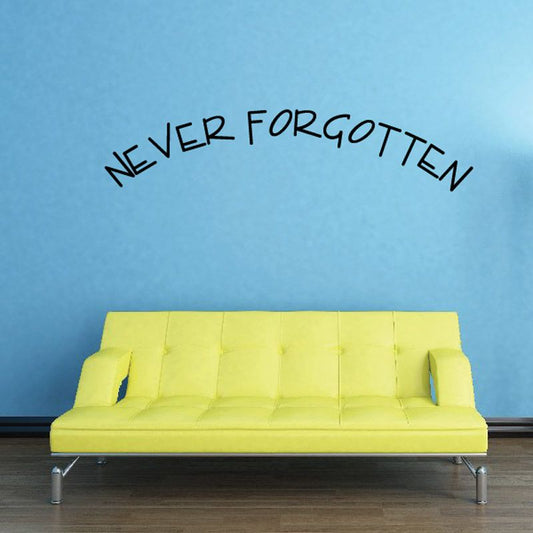 Vinyl memorial wall decal reading "Never Forgotten" in black letters