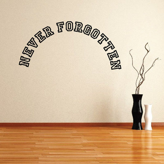 Vinyl wall decal with arched “Never Forgotten” lettering in black