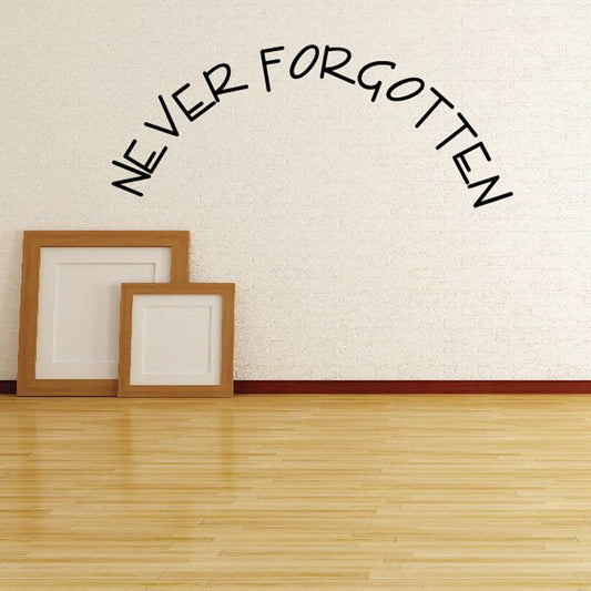 Vinyl wall decal reading “NEVER FORGOTTEN” in black lettering