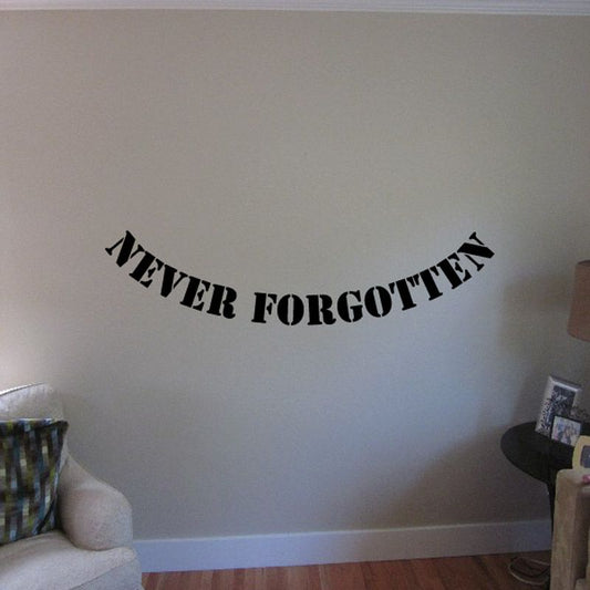 Never Forgotten wall decal with arched black serif text on light wall