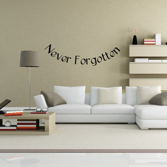 Vinyl wall decal with black cursive text reading 'Never Forgotten'