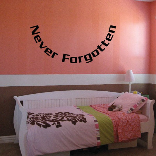Vinyl wall decal with black text: 'Never Forgotten In Loving Memory'