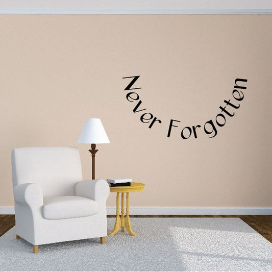 Vinyl wall decal with cursive text “Never Forgotten” and “In loving memory”