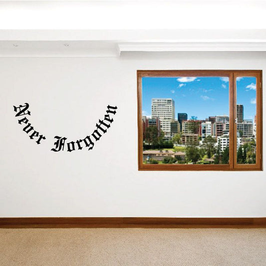 Vinyl wall decal with black Gothic Never Forgotten text