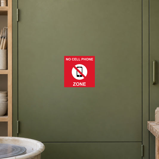 No cellphone zone sticker with red frame, phone icon, and white text